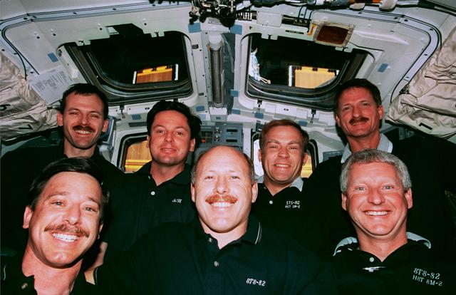 Crew portrait in the orbiter flight deck