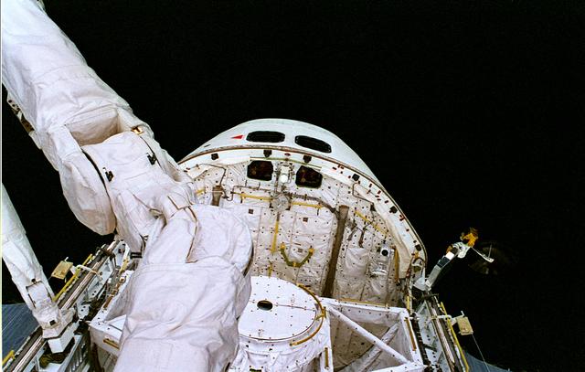 NASA image: EVA 2 activity on Flight Day 5 - handheld camera views