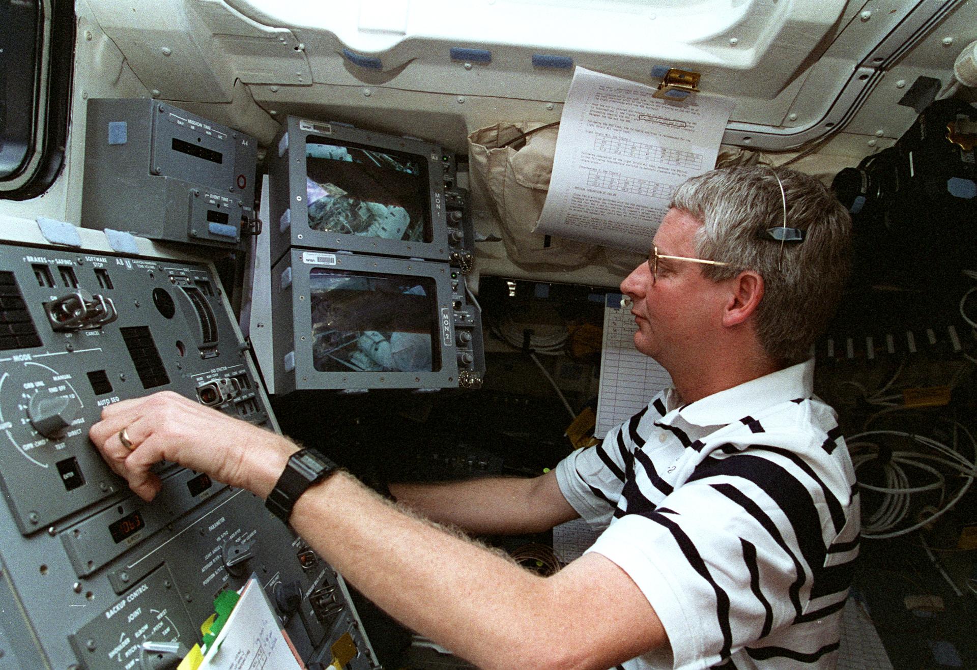 Steve Hawley works with Discovery's Remote Manipulator System for STS-82.
