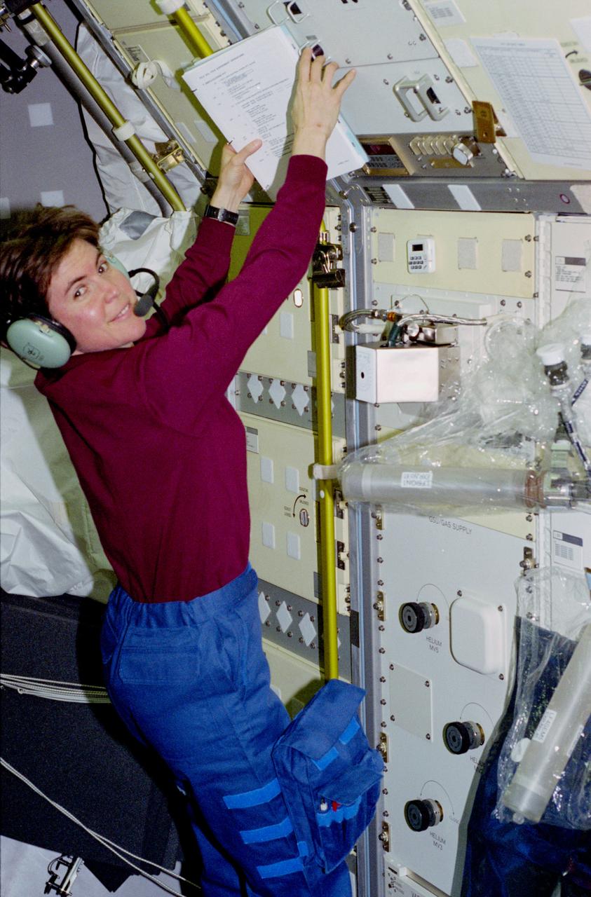 STS083-318-001 (4-8 April 1997) --- Mission specialist Janice E. Voss, payload commander, participates in the activation of the Spacelab Science Module aboard the Earth-orbiting Space Shuttle Columbia.  Crewed by Voss, four other NASA astronauts and two payload specialists, the scheduled 16-day mission was later cut short by a power shortage.