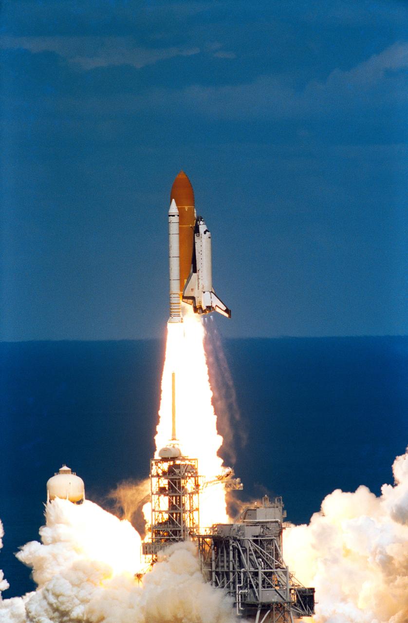 STS083-S-003 (4 April 1997)--- With the Atlantic Ocean in the background, the Space Shuttle Columbia heads toward Earth-orbit from Launch Pad 39A at 2:20:32 p.m. (EST), April 4, 1997, from the Kennedy Space Center (KSC). Onboard the spacecraft to support the Microgravity Science Laboratory 1 (MSL-1) mission were astronauts James D. Halsell, commander; Susan L. Still, pilot; Janice E. Voss, payload commander; Michael L. Gernhardt and Donald A. Thomas, both mission specialists; along with payload specialists Roger K. Crouch and Gregory T. Linteris. A problem with a fuel cell caused the crew to cut the mission short and return to Earth on April 8, 1997.