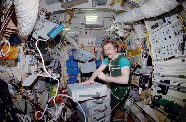 NASA image: Lazutkin conducts transfer ops in the Mir Space Station Base Block