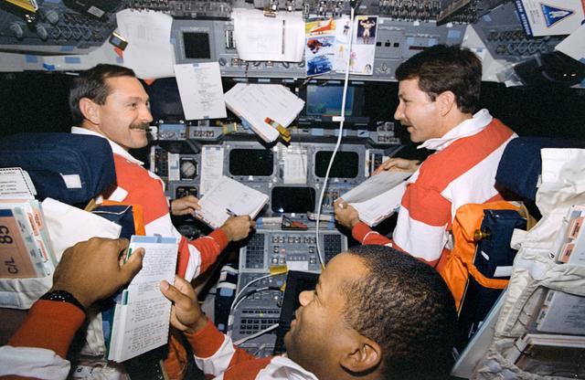 NASA image: Brown, Rominger and Curbeam conduct flight control systems checkout