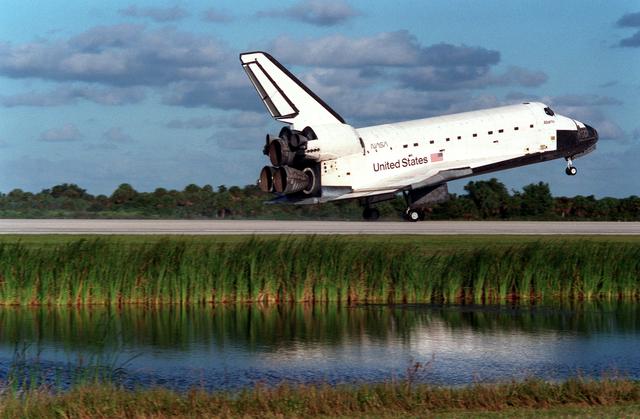 NASA image: Various views of the STS-86 orbiter Atlantis landing at KSC