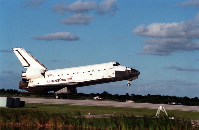 NASA image: Various views of the STS-86 orbiter Atlantis landing at KSC