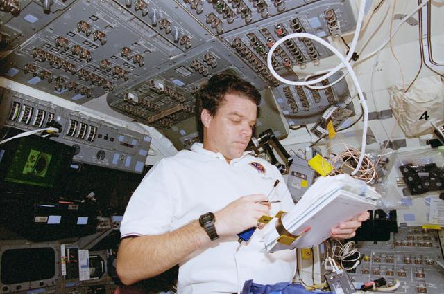 NASA image: Scott and Kregel work in the flight deck