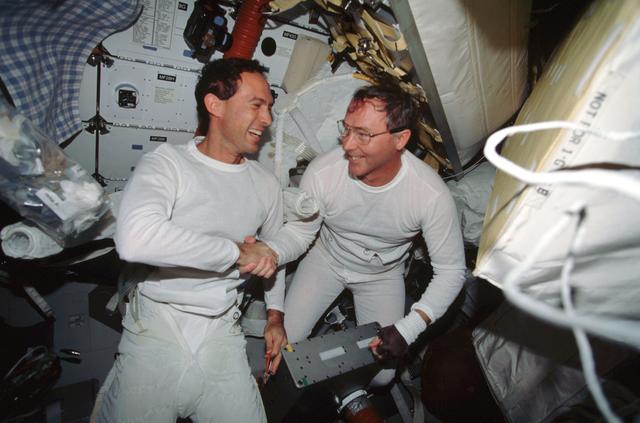 NASA image: Newman and Ross on the middeck after one of their EVA