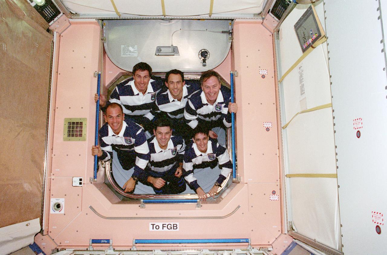 STS088-370-006  (4-15 Dec. 1998) --- The STS-88 crew members pose for the traditional inflight crew portrait in the U.S.-built Unity connecting module.  From left to right, bottom, are astronauts Frederick W. (Rick) Sturckow, pilot; Robert D. Cabana, mission commander; and Nancy  J. Currie, mission specialist.  Top row, cosmonaut Sergei K. Krikalev,  representing the Russian Space Agency, along with astronauts James H. Newman and Jerry L. Ross, all mission specialists.