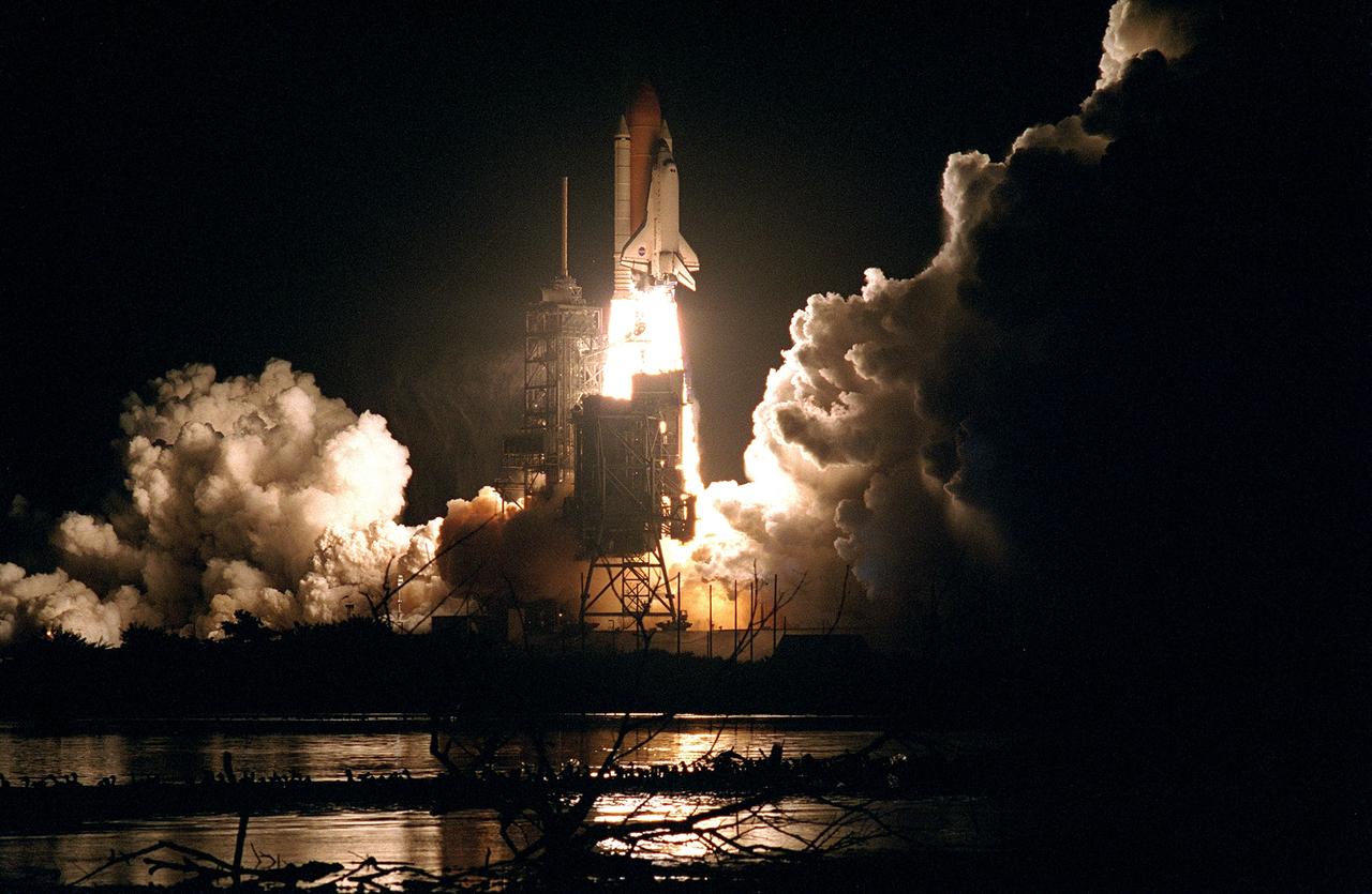 STS088-S-005 (4 Dec. 1998) --- The Space Shuttle Endeavour lights up the night sky as it embarks on the first mission dedicated to the assembly of the International Space Station (ISS).  Liftoff occurred at 3:35:34 a.m. (EST), December 4, 1998, from Launch Pad 39A at the Kennedy Space Center (KSC), Florida.  Onboard were astronauts Robert D. Cabana, mission commander; Frederick W. Sturckow, pilot; Nancy J. Currie, Jerry L. Ross and James H. Newman, along with Russian Space Agency (RSA) cosmonaut Sergei K. Krikalev, all mission specialists.