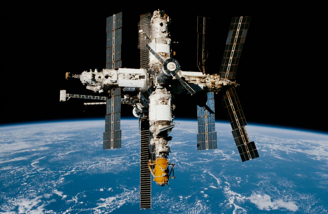 STS089-346-007 (22-31 Jan 1998) --- After several days of joint activities between NASA astronauts and Russian cosmonauts in Earth-orbit, the Space Shuttle Endeavour?s crew recorded a series of 35mm and 70mm ?flyaround? survey photos of Russia?s Mir Space Station.  Earth?s horizon serves as the backdrop for this 35mm scene.