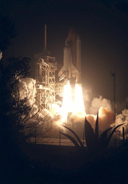 STS089-S-010 (22 Jan. 1998) --- The space shuttle Endeavour heads toward its Earth-orbital destination to the Russian Mir Space Station. Endeavour lifted off from Launch Pad 39A at 9:48:15 p.m. (EST), Jan. 22, 1998. STS-89 represents the eighth docking mission with Mir (all previous such flights utilized the Atlantis).  After the docking with Mir, Andrew S. W. Thomas, mission specialist, will transfer to the station, succeeding astronaut David A. Wolf as guest cosmonaut researcher. Wolf will return to Earth aboard Endeavour.  Thomas is expected to live and work on Mir until June 1998. Other astronauts onboard were Terrence W. Wilcutt, Joe F. Edwards Jr., Bonnie J. Dunbar, James F. Reilly, Michael P. Anderson and Salizhan S. Sharipov.  Sharipov represents the Russian Space Agency (RSA). Photo credit: NASA