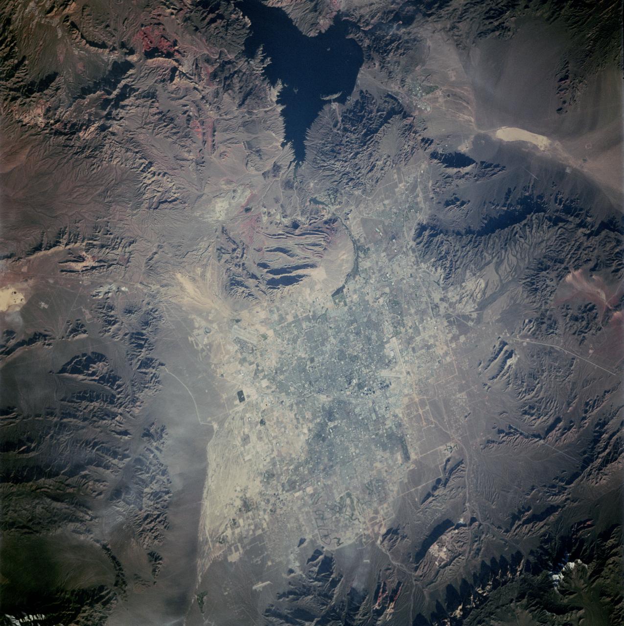 STS090-756-046 (17 April - 3 May 1998) --- A 70mm view of the Las Vegas, Nevada area, including the western-most tip of Lake Mead.  The flight track of the Space Shuttle Columbia and lack of heavy cloud cover during the 16-day Neurolab mission allowed the astronauts a number of opportunities to photograph North American cities.