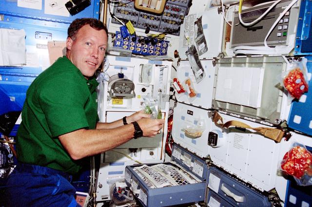 NASA image: Crewmember activity in the orbiter middeck