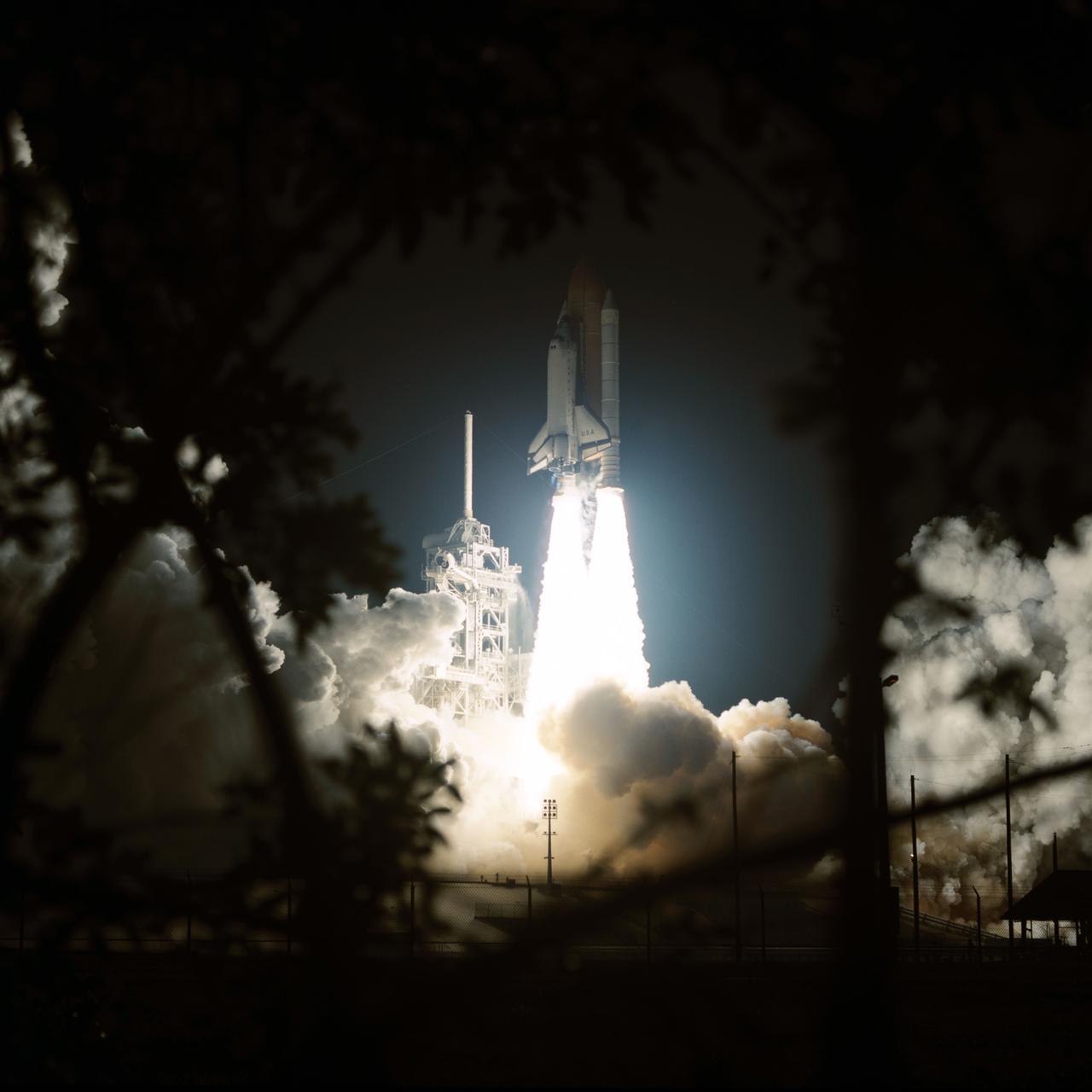 STS93-S-005 (23 July 1999) --- The Space Shuttle Columbia lifts off from Launch Pad 39B to begin the five-day STS-93 mission in this 70mm frame. After two unsuccessful attempts earlier in the week, liftoff occurred at 12:31 a.m. (EDT), July 23, 1999. Only hours after this picture was taken, the five-member crew released the Chandra X-Ray Observatory into orbit. Onboard were astronauts Eileen M. Collins, first woman shuttle mission commander; Jeffrey S. Ashby, pilot; and Steven A. Hawley, Catherine G. Coleman and Michel Tognini, all mission specialists. Tognini represents the Centre National d'Etudes Spatiales (CNES) of France.