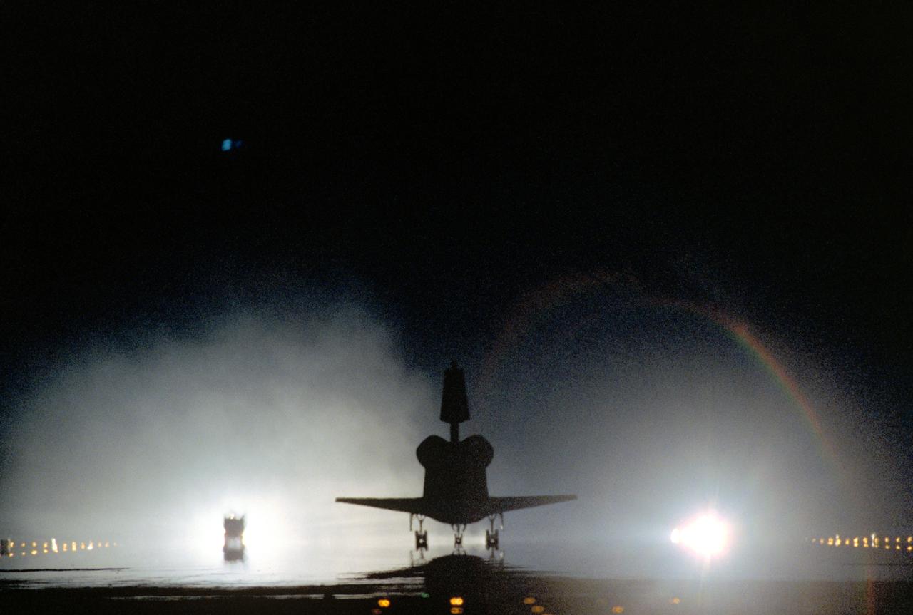 STS093-(S)-010 (27 July 1999) --- The Space Shuttle Columbia rolls along runway 33 at the Kennedy Space Center's  Shuttle Landing Facility following  a successful mission of nearly five days and 1.8 million miles.  Main gear touchdown was at 11:20:35 a.m. (EDT),  July 27, 1999.