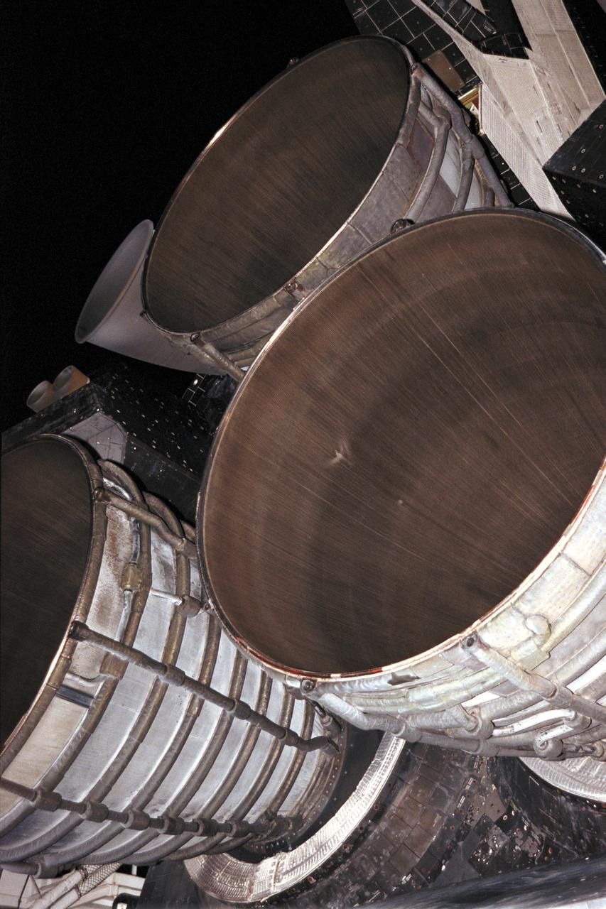 STS093-(S)-015 (28 July 1999) --- Following the landing of the Space Shuttle Columbia on July 27, 1999, this medium close-up low-angle view of the three main engines shows what appears to be three small holes in the liquid hydrogen tubes inside the nozzle on main engine No. 3. Engineers will examine the engine to determine if a possible hydrogen leak occurred during the STS-93 launch on July 23.