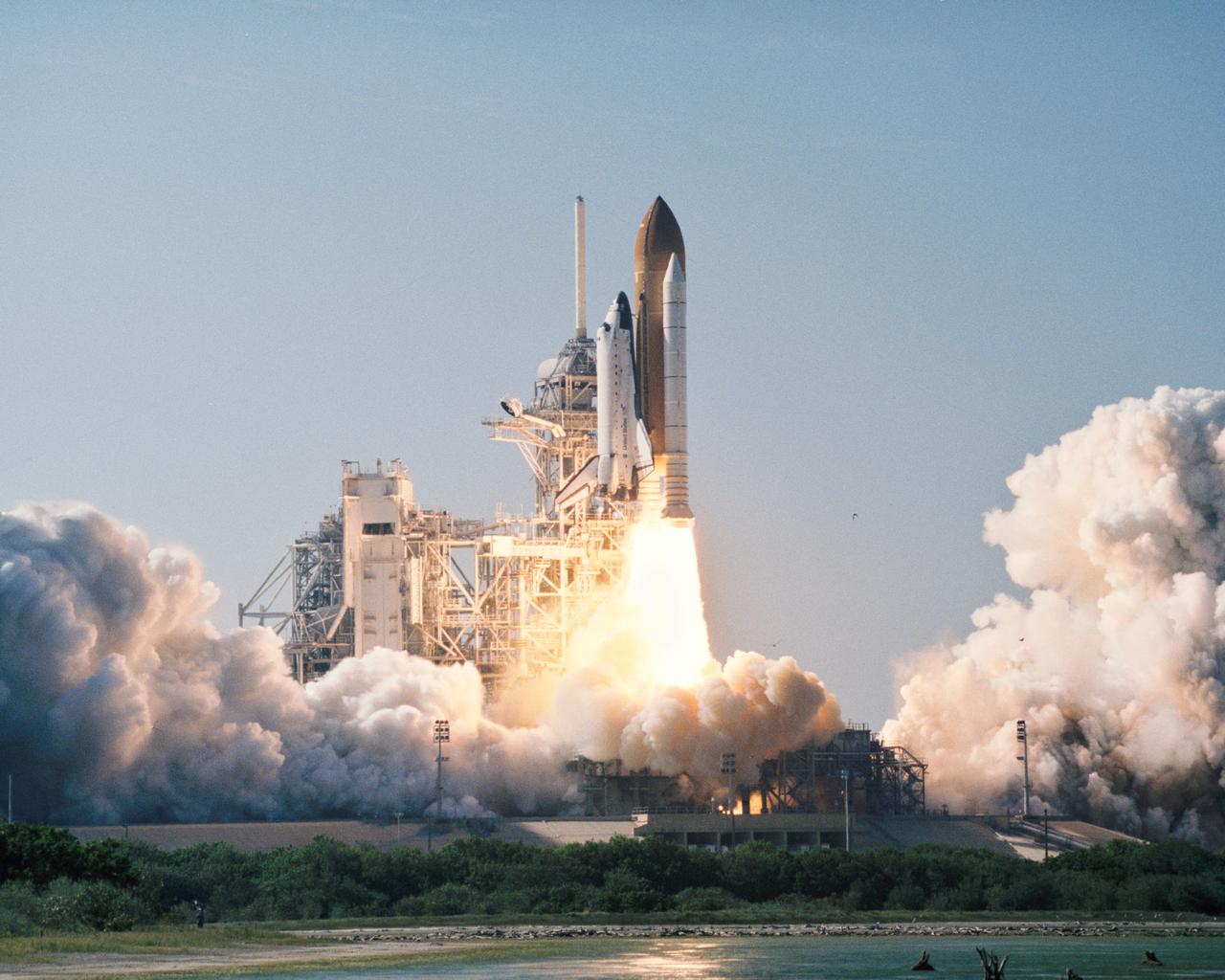 STS095-S-006 (29 Oct. 1998) --- The space shuttle Discovery lifts off Launch Pad 39B to begin a nine-day mission in Earth-orbit. Launch was at 2:19 p.m. (EST), Oct. 29, 1998. Onboard were Curtis L. Brown Jr., Steven W. Lindsey, Scott F. Parazynski, Steven K. Robinson, Pedro Duque, United States Senator John H. Glenn Jr. and Chiaki Naito-Mukai. Duque is a mission specialist representing the European Space Agency (ESA) and Mukai is a payload specialist representing Japan's National Space Development Agency (NASDA). Glenn, making his second spaceflight but his first in 36 years, joins Mukai as a payload specialist on the mission. Photo credit: NASA