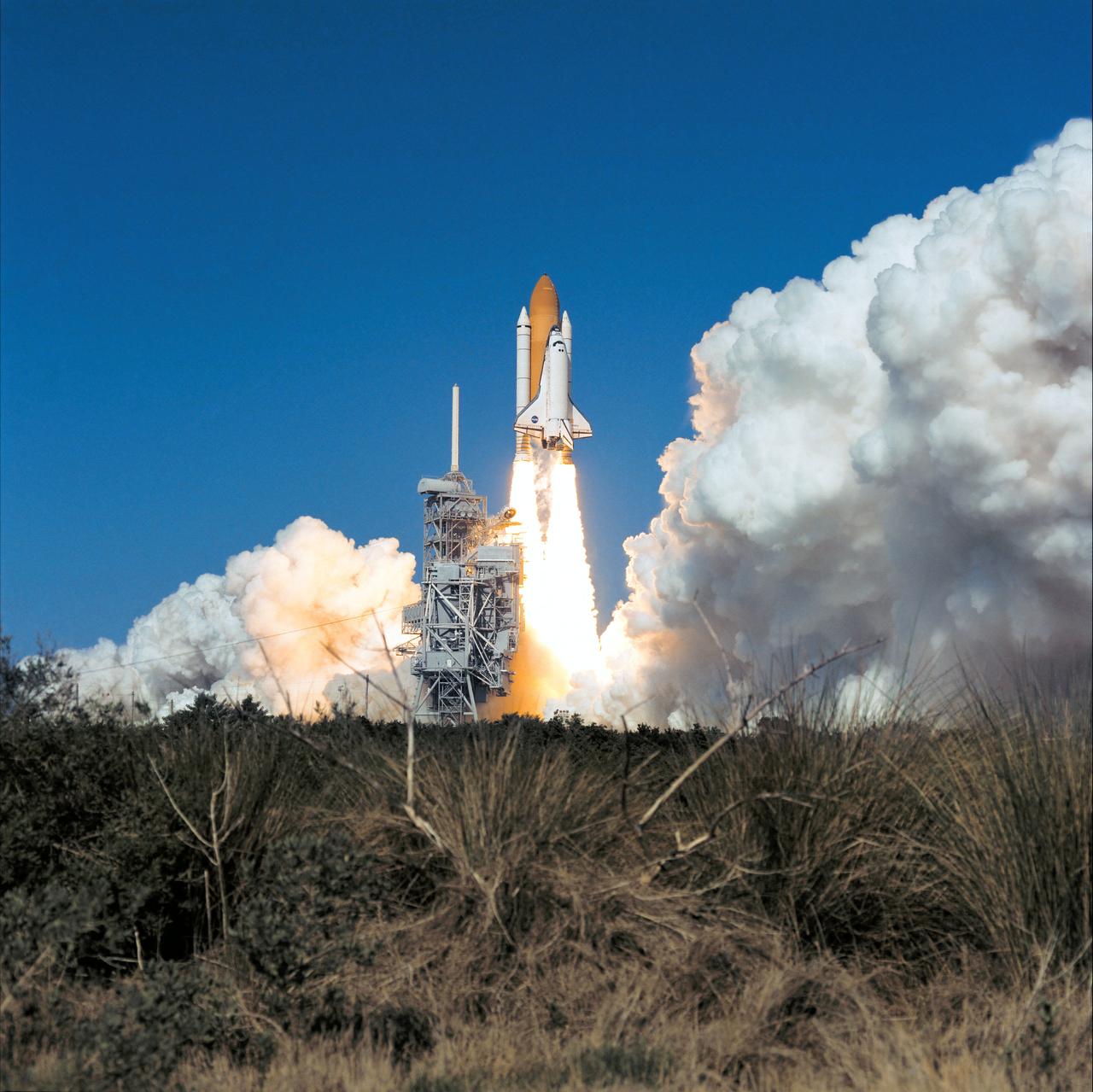 STS095-S-017 (29 Oct. 1998) --- The space shuttle Discovery lifts off Launch Pad 39B to begin a nine-day mission in Earth-orbit. Launch was at 2:19 p.m. (EST), Oct. 29, 1998. Onboard were Curtis L. Brown Jr., Steven W. Lindsey, Scott F. Parazynski, Steven K. Robinson, Pedro Duque, United States Senator John H. Glenn Jr. and Chiaki Naito-Mukai. Duque is a mission specialist representing the European Space Agency (ESA) and Mukai is a payload specialist representing Japan's National Space Development Agency (NASDA). Glenn, making his second spaceflight but his first in 36 years, joins Mukai as a payload specialist on the mission. Photo credit: NASA