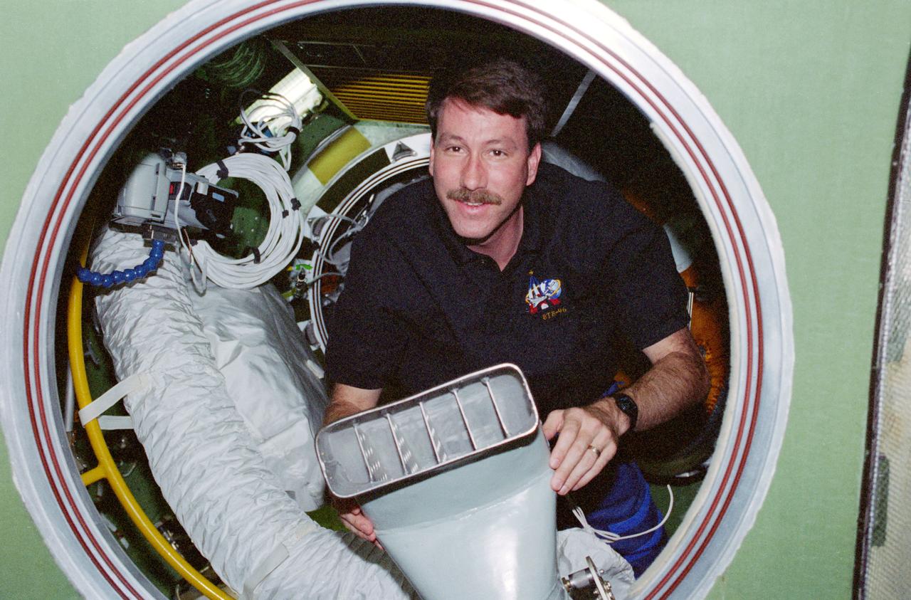 STS096-357-013 (27 May - 6 June 1999) --- Astronaut Kent V. Rominger, mission commander, participates in the move of supplies from Discovery to the International Space Station (ISS). Rominger was joined by four other American astronauts, a Canadian astronaut and a Russian cosmonaut for almost ten days in space, most of which were devoted to preparing the ISS.