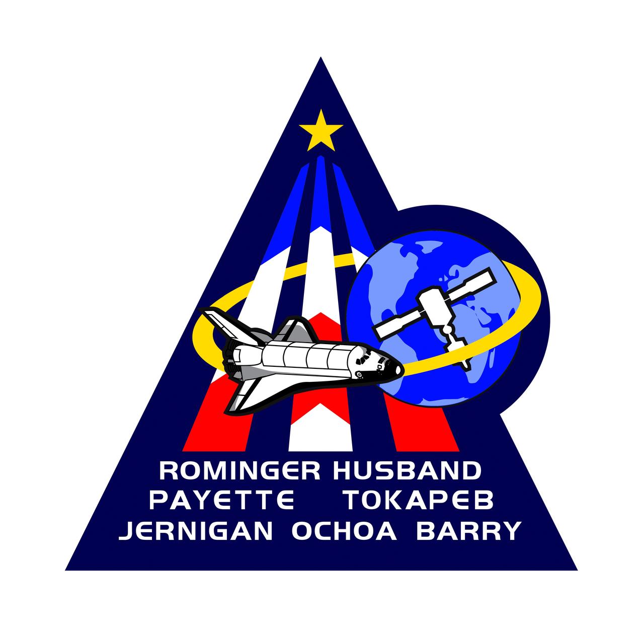 STS96-S-001 (February 1999) --- Designed by the crew members, this is the mission insignia for the STS-96 spaceflight, the second space shuttle mission dedicated to the assembly of the International Space Station (ISS). The crew patch highlights the major themes of the Station Program: Earth-directed research, the advancement of human space exploration, and international cooperation. The space shuttle Discovery is depicted shortly after reaching orbit as the crew prepares to carry out the first docking with the new space station. At this early stage in its construction, ISS consists of two modules: Zarya and Unity, shown orbiting Earth. The triangular shape of the patch represents building on the knowledge and experience of earlier missions, while the three vertical bars of the astronaut emblem point toward future human endeavors in space. The five-pointed star that tops the astronaut emblem in this depiction is symbolic of the five space agencies participating in the development of ISS: National Aeronautics and Space Administration (NASA), the Russian Space Agency (RSA), the European Space Agency (ESA), the National Space Development Agency of Japan (NASDA), and the Canadian Space Agency (CSA). The blend of red, white, and blue is a tribute to the nationalities of the crew members who are from the United States, Canada, and Russia.    The NASA insignia design for space shuttle flights is reserved for use by the astronauts and for other official use as the NASA Administrator may authorize. Public availability has been approved only in the forms of illustrations by the various news media. When and if there is any change in this policy, which is not anticipated, the change will be publicly announced. Photo credit: NASA