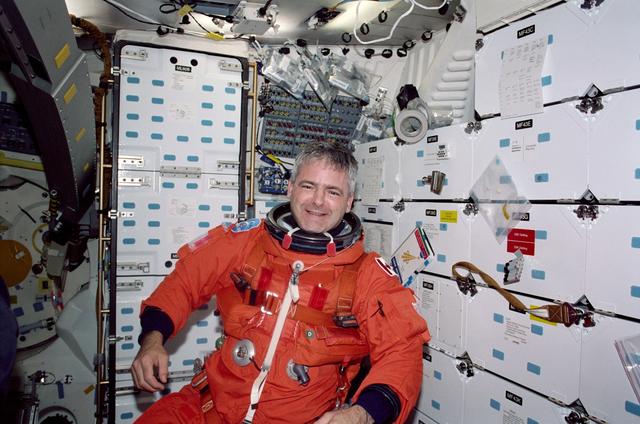 NASA image: MS Garneau in his LES during re-entry preparations for STS-97