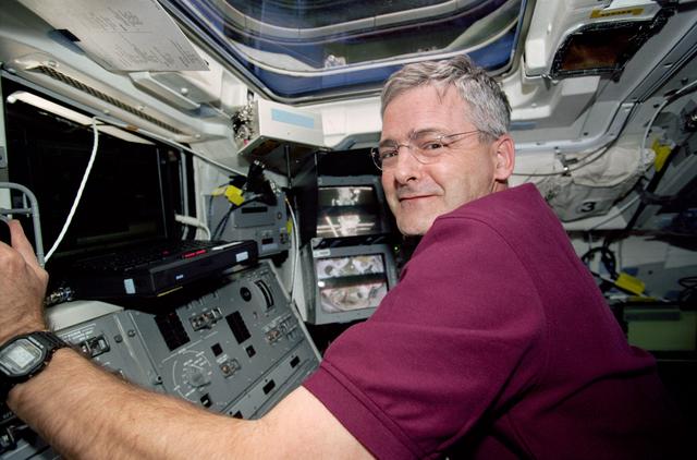 NASA image: MS Garneau operates the RMS arm during the third EVA of STS-97