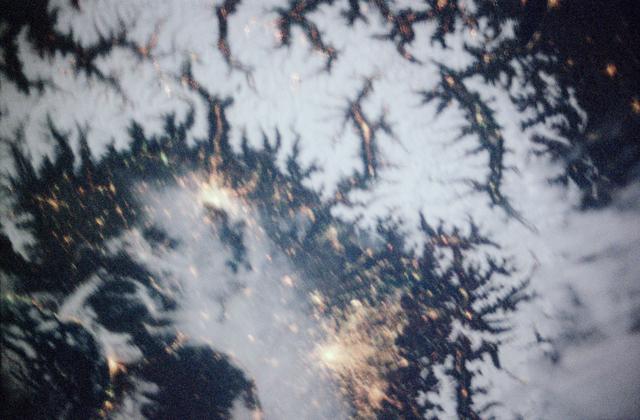 NASA image: Earth observations of city lights in the Alps taken during STS-97