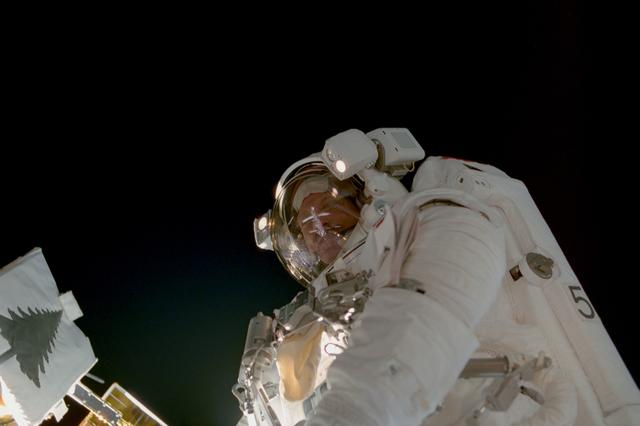 NASA image: Tanner poses by the Floating Potential Probe during the third EVA of STS-97