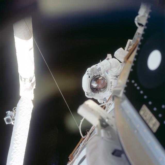 NASA image: View of MS Noriega waves to the camera during the third EVA of STS-97