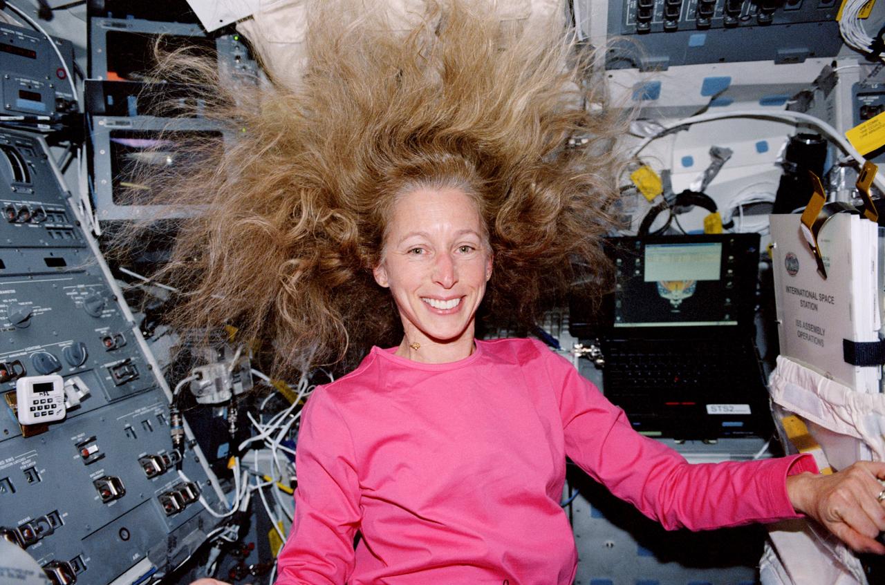 STS098-348-015 (7-20 February 2001) --- Astronaut Marsha S. Ivins, STS-98 mission specialist, is photographed on the mid deck of the Earth-orbiting Space Shuttle Atlantis.