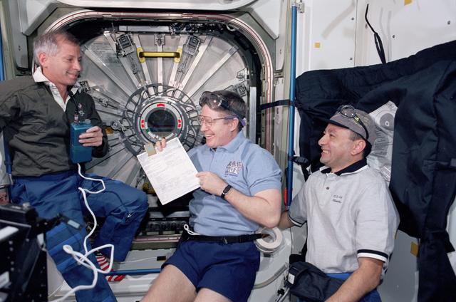 NASA image: STS-98 and Expedition One crew prepare to open U.S. Lab hatch
