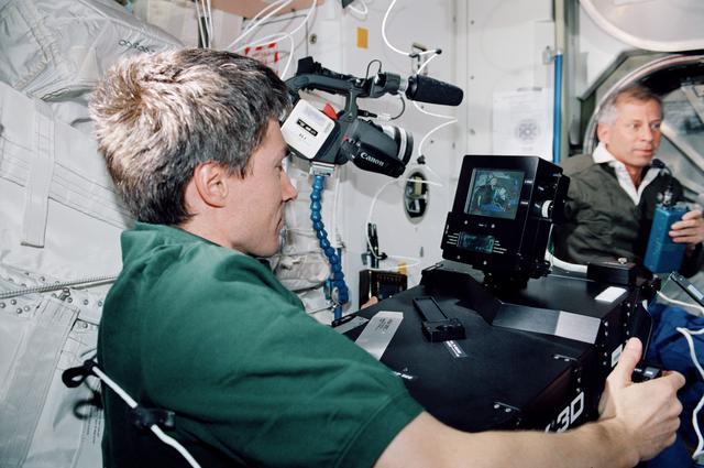 NASA image: STS-98 and Expedition One crew prepare to open U.S. Lab hatch