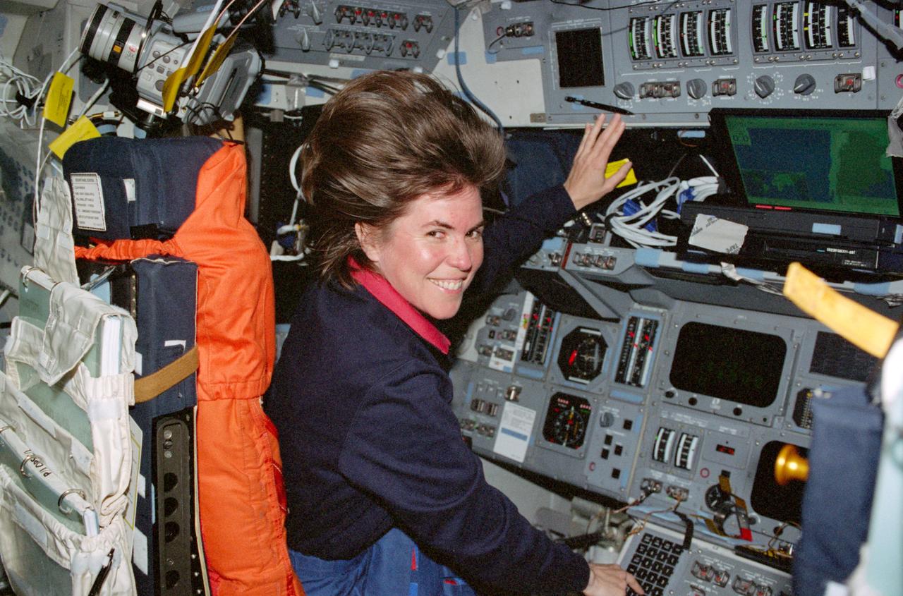 STS099-330-034 (11-22 February 2000) ---  Astronaut Janice Voss, a member of the  Blue Team portion of 24-hour SRTM support, is pictured on the flight deck of the Space Shuttle Endeavour.