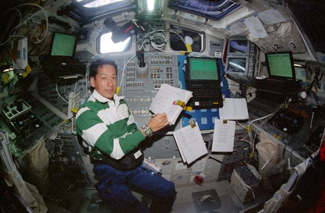 NASA image: STS-99 MS Mohri works on OV-105's flight deck