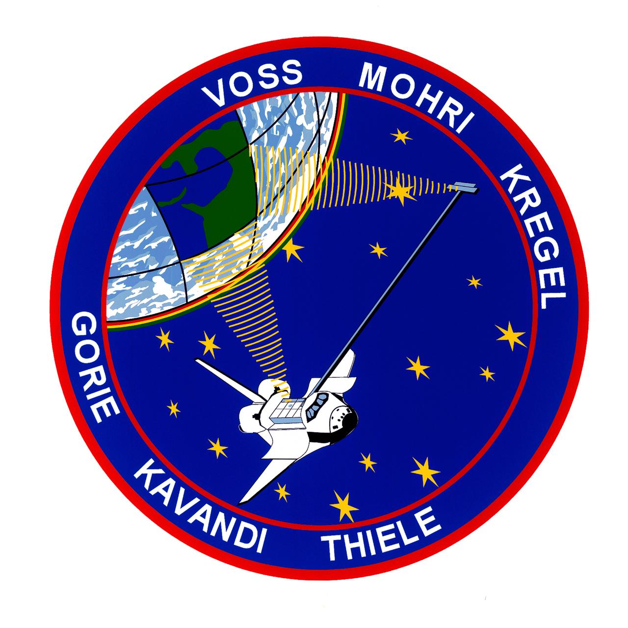 STS099-S-001 (June 1999) --- The STS-99 crew members designed the flight insignia for the Shuttle Radar Topography Mission (SRTM), the most ambitious Earth mapping mission to date. Two radar antennas, one located in the shuttle bay and the other located on the end of a 60-meter deployable mast, will be used during the mission to map Earth?s features. The goal is to provide a three-dimensional topographic map of the world?s surface up to the Arctic and Antarctic Circles. The clear portion of Earth illustrates the radar beams penetrating its cloudy atmosphere and the unique understanding of the home planet that is provided by space travel. The grid on Earth reflects the mapping character of the SRTM mission. The patch depicts the space shuttle Endeavour orbiting Earth in a star spangled universe. The rainbow along Earth?s horizon resembles an orbital sunrise. The crew deems the bright colors of the rainbow as symbolic of the bright future ahead because of human beings? venturing into space.    The NASA insignia design for space shuttle flights is reserved for use by the astronauts and for other official use as the NASA Administrator may authorize. Public availability has been approved only in the forms of illustrations by the various news media. When and if there is any change in this policy, which is not anticipated, the change will be publicly announced. Photo credit: NASA