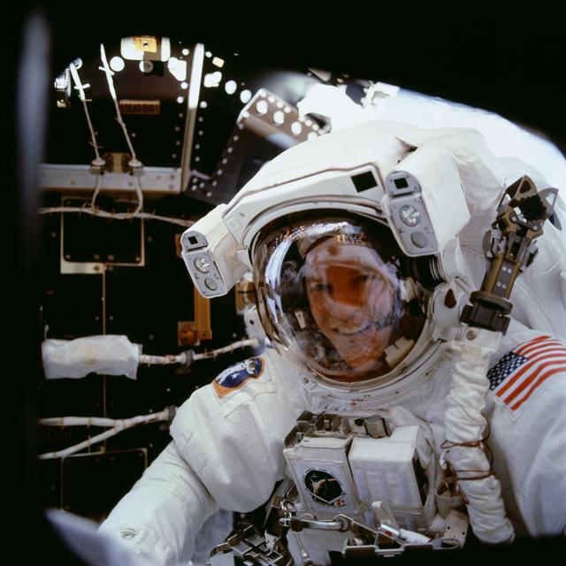 NASA image: MS Parazynski looks in on his fellow crewmembers during the first EVA of STS-100