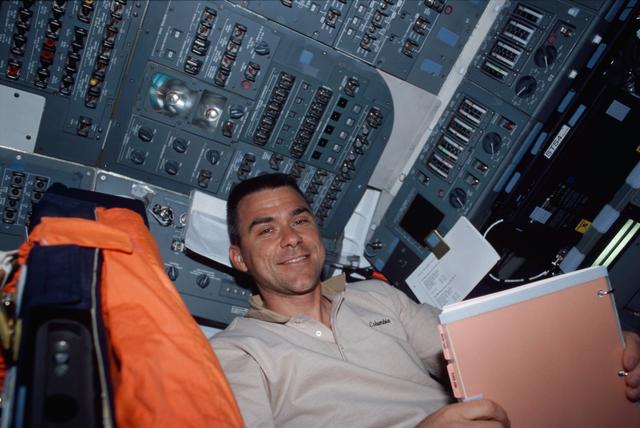 NASA image: PLT Carey at commander's station on forward flight deck