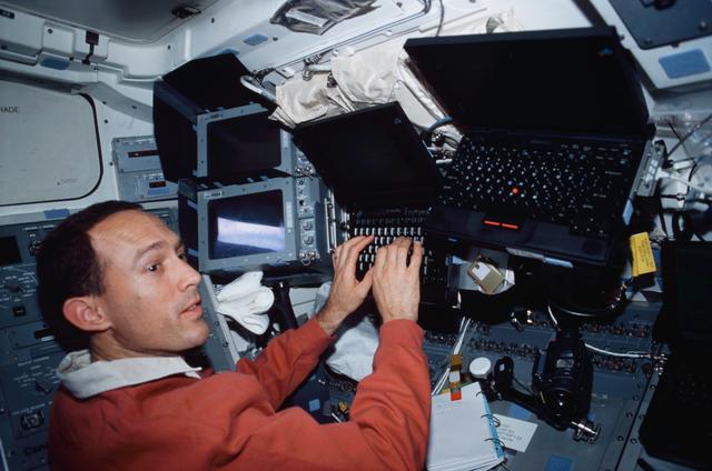 NASA image: MS Newman enters data into a PGSC on flight deck