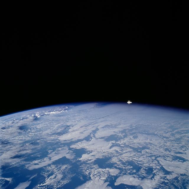 NASA image: Distant views of Hubble over Earth Limb after redeploy