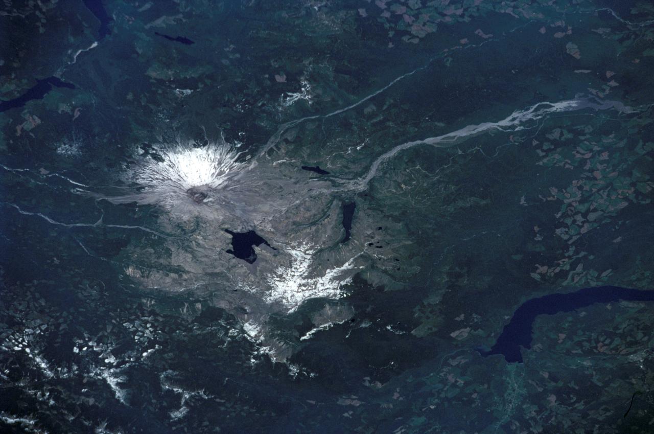 STS111-371-003 (5-19 June 2002) --- This photo, showing Mt. St. Helens in the state of Washington, was taken by the STS-111 crewmembers aboard the Space Shuttle Endeavour.  The scars from the May 18, 1980 eruption are still visible near Mt. St. Helens.  Before the 1980 eruption the volcano had been dormant since 1857. The Gateway to Astronaut Photography of Earth (link to http://eol.jsc.nasa.gov/sseop/) provides searchable access to other photographs of Earth taken by astronauts.
