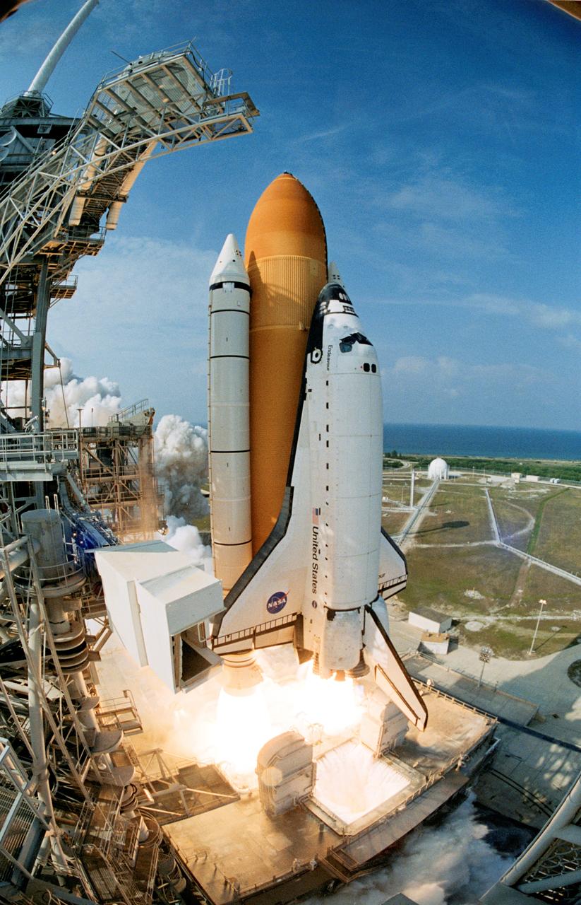 STS111-S-005 (5 June 2002) --- The Space Shuttle Endeavour lifts off, creating billows of smoke and steam on its way into space for mission STS-111 to the International Space Station (ISS). Liftoff occurred at 5:22:49 p.m. (EDT), June 5, 2002. The STS-111 crew includes astronauts Kenneth D. Cockrell, commander; Paul S. Lockhart, pilot, and Franklin R. Chang-Diaz and Philippe Perrin, mission specialists. Also onboard were the Expedition Five crewmembers including cosmonaut Valery G. Korzun, commander, along with astronaut Peggy A. Whitson and cosmonaut Sergei Y. Treschev, flight engineers. Perrin represents CNES, the French space agency, and Korzun and Treschev are with the Russian Aviation and Space Agency (Rosaviakosmos). This mission marks the 14th shuttle flight to the International Space Station and the third shuttle mission this year. Mission STS-111 is the 18th flight of Endeavour and the 110th flight overall in NASA's Space Shuttle program.