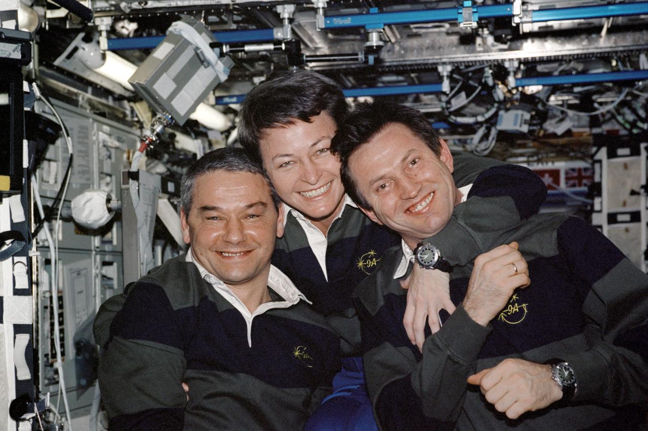 STS112-329-008 (13 October 2002) --- The Expedition Five crewmembers pose for a photo in the Destiny laboratory on the International Space Station (ISS). From the left are cosmonaut Valery G. Korzun, mission commander; astronaut Peggy A. Whitson and cosmonaut Sergei Y. Treschev, both flight engineers. Korzun and Treschev represent Rosaviakosmos.