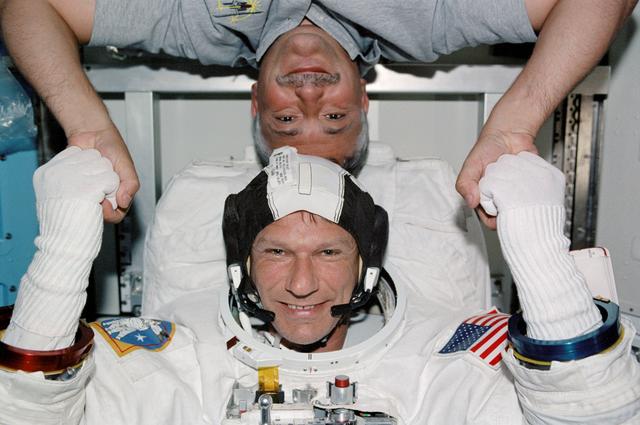 NASA image: Portrait view of STS-112 MS Sellers and MS Yurchikhin in Quest airlock