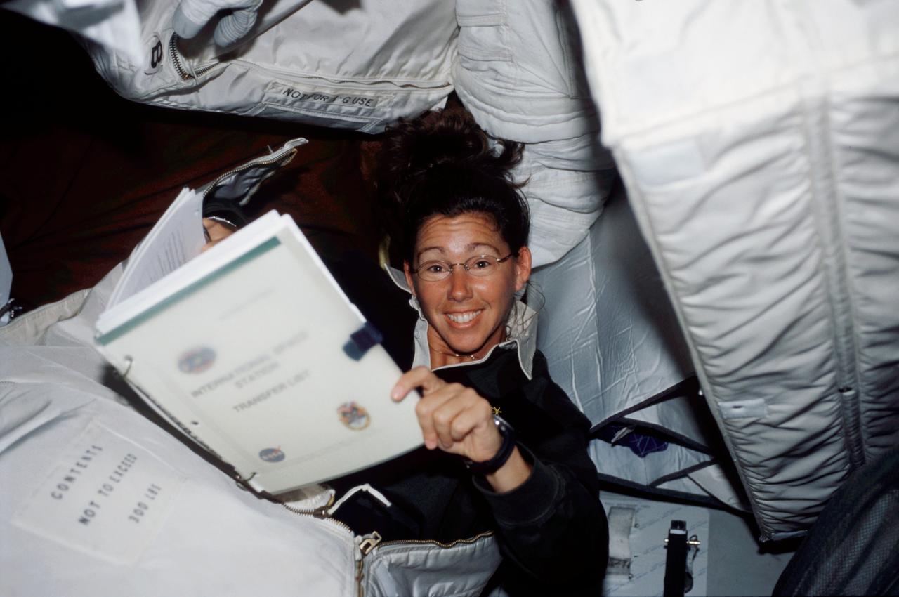STS112-367-006 (15 October 2002) --- Astronaut Sandra H. Magnus, STS-112 mission specialist, participates in the ongoing effort to move supplies from the Space Shuttle Atlantis to the International Space Station (ISS).