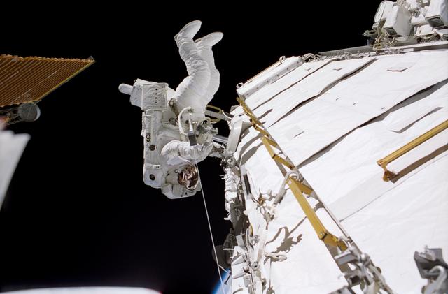 NASA image: Herrington works at the P1 truss during  STS-113 EVA 3