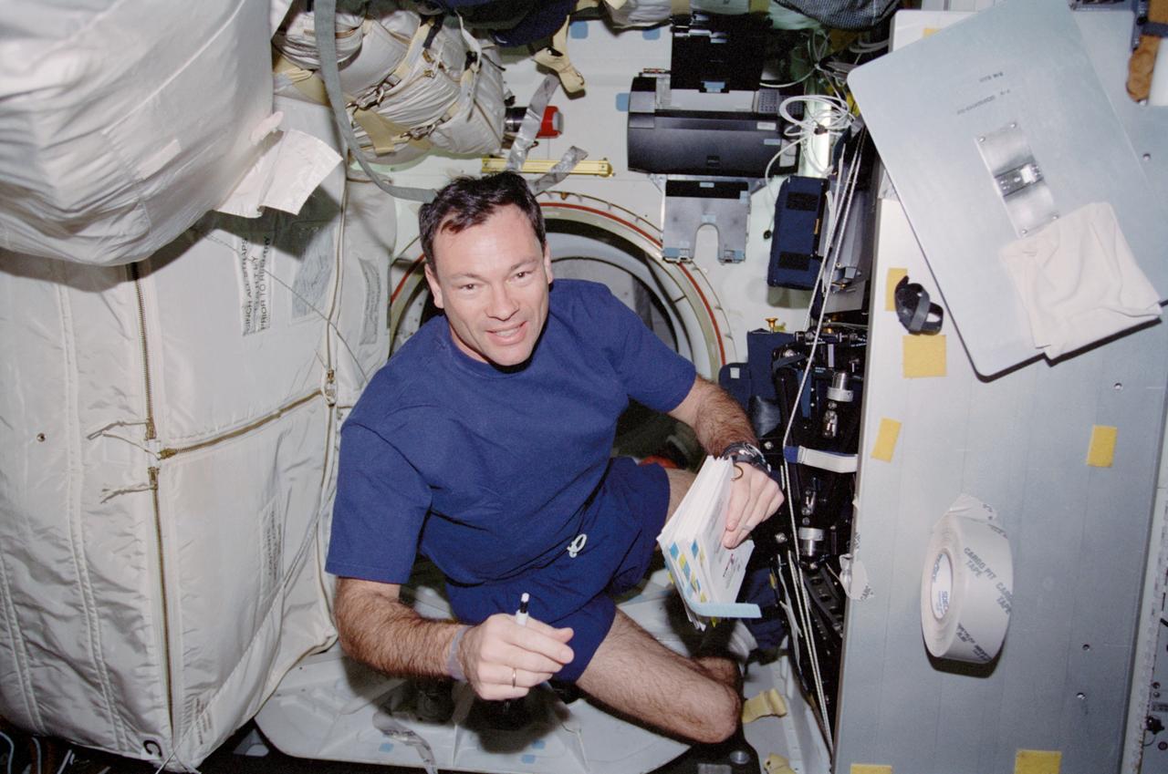 STS113-313-036 (23 November &#0150; 7 December 2002) --- Astronaut Michael E. Lopez-Alegria, STS-113 mission specialist, pictured on the middeck of the Space Shuttle Endeavour.