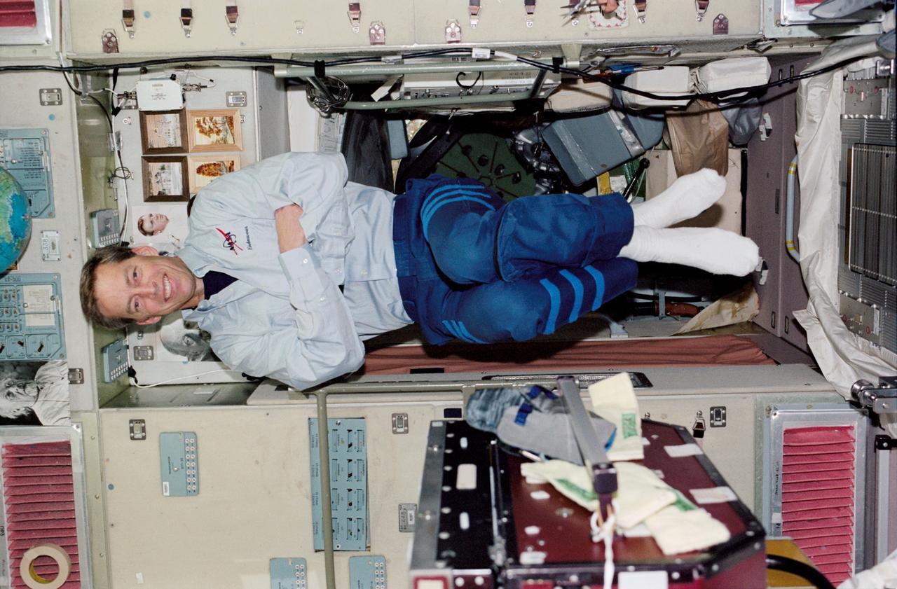 STS113-339-005 (23 November &#0150; 7 December 2002) --- Astronaut James D. Wetherbee, STS-113 mission commander, floats in the Zvezda Service Module on the International Space Station (ISS).