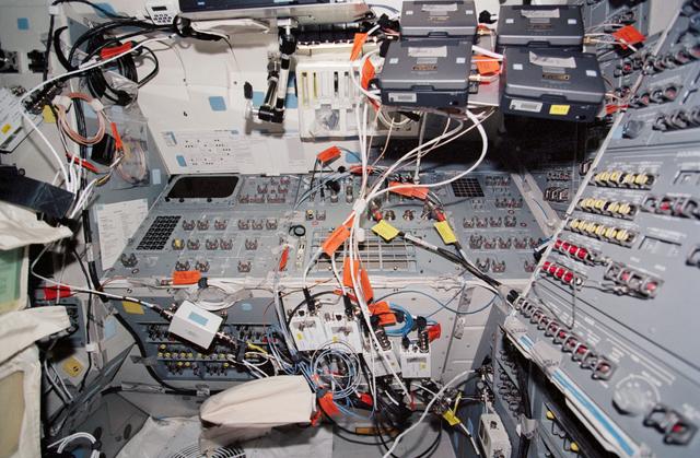 NASA image: DVCAM recorders, wiring, laptop computers and monitors on Endeavour's AFD during STS-113