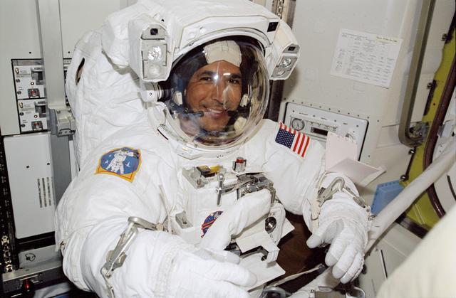 NASA image: Herrington, in EMU, during preparations for STS-113 EVA 1 in the Quest A/L