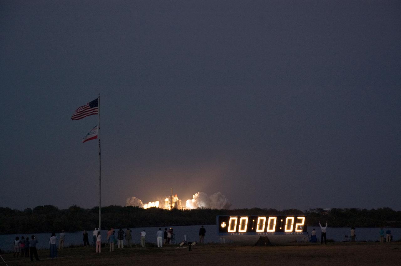 STS119-S-009 (15 March 2009) --- The Space Shuttle Discovery and its seven-member STS-119 crew head toward Earth orbit and a scheduled link-up with the International Space Station. Liftoff was on time at 7:43 p.m. (EDT) on March 15, 2009 from launch pad 39A at NASA’s Kennedy Space Center. Onboard are astronauts Lee Archambault, commander; Tony Antonelli, pilot; Joseph Acaba, Steve Swanson, Richard Arnold, John Phillips and Japan Aerospace Exploration Agency’s Koichi Wakata, all mission specialists. Wakata will join Expedition 18 in progress to serve as a flight engineer aboard the space station. Discovery will deliver the final pair of power-generating solar array wings and the S6 truss segment. Installation of S6 will signal the station's readiness to house a six-member crew for conducting increased science.